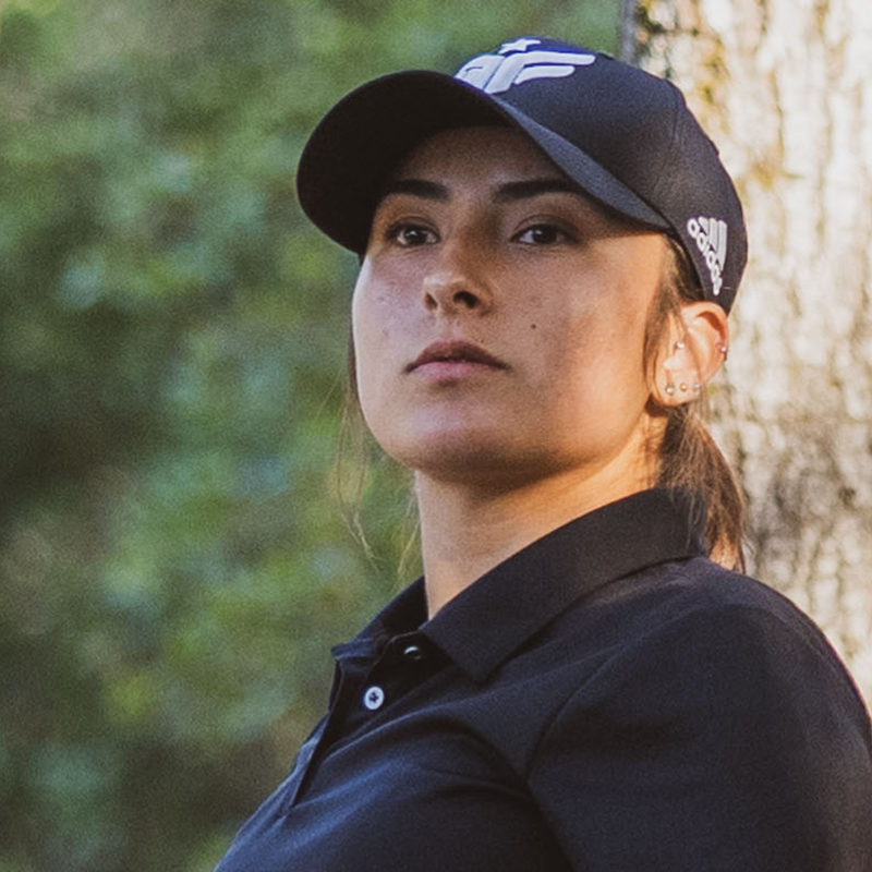 A headshot of Team GRIPeq member, Alexis Mandujano as she looks slightly towards the left side of the frame.