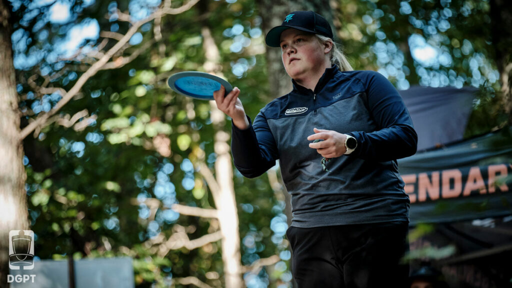 Eveliina Salonen holds the disc in her right had as she lines up a forehand throw.