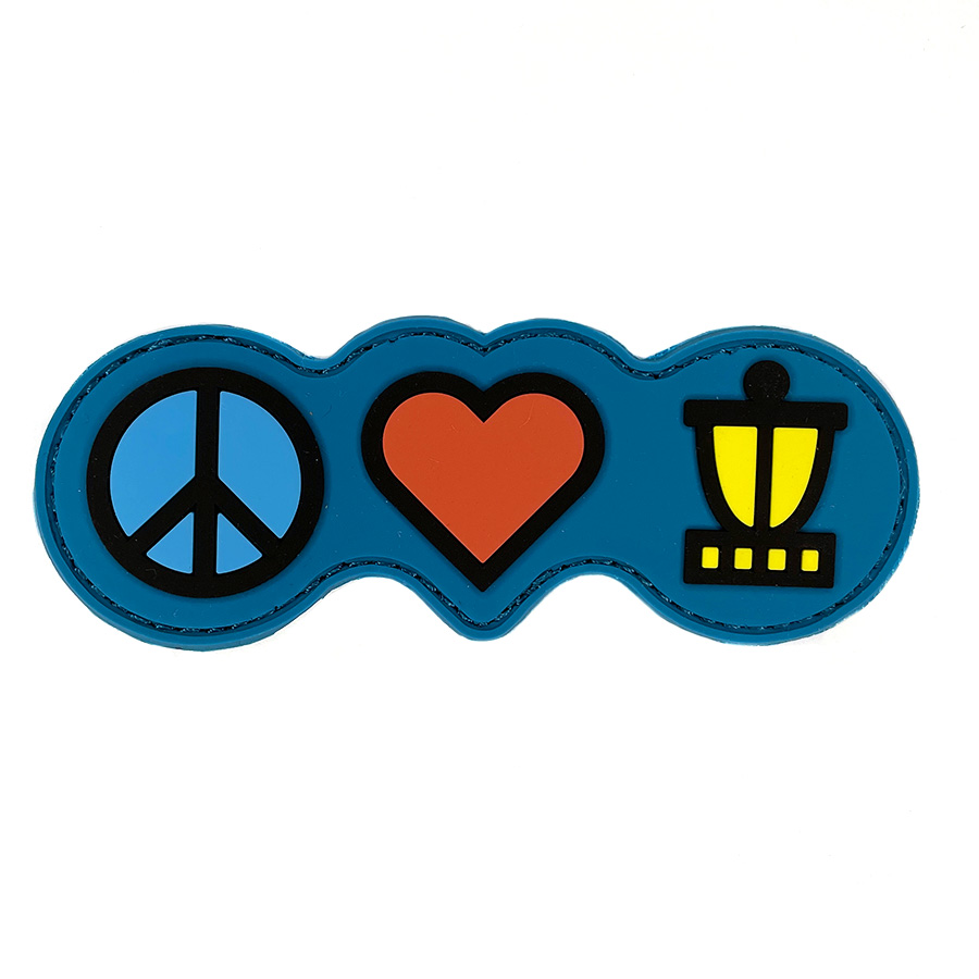 A GRIPeq peace, love, disc golf patch.