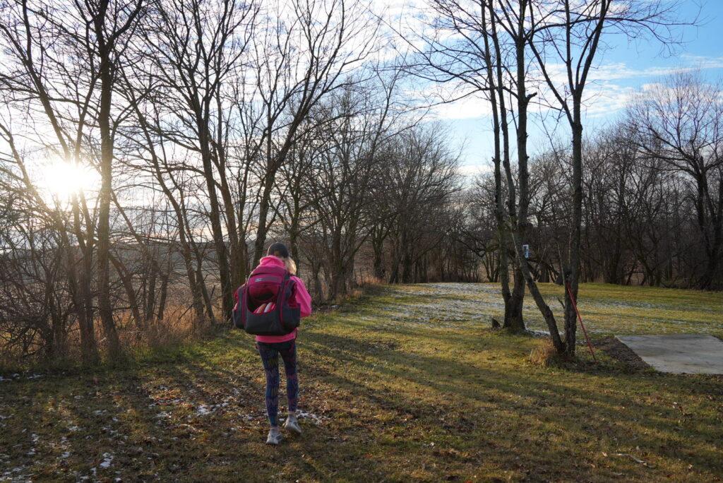 Team GRIPeq member Genevieve Davis walking with her GRIPeq bag on her back.