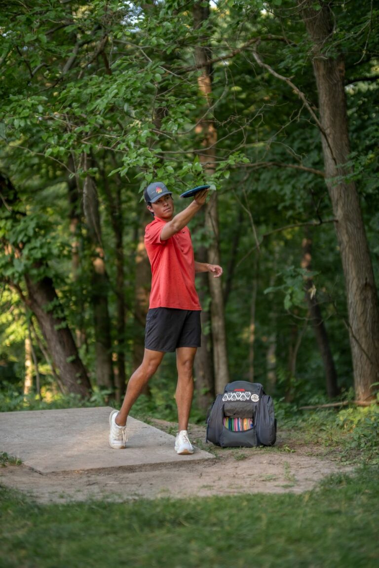 Team GRIPeq pro Anthony Barela lines up a shot on the tee pad. He's using a Gray BX3 bag.
