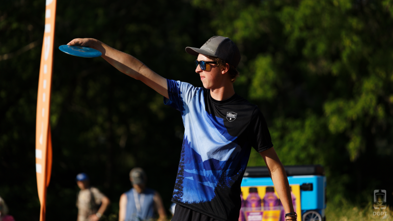 GRIPeq team member Kyle Klein lining up a shot at a tournament.