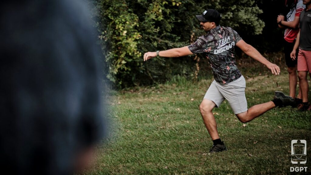 Paul McBeth mid-throw during a Disc Golf Pro Tour tournament.