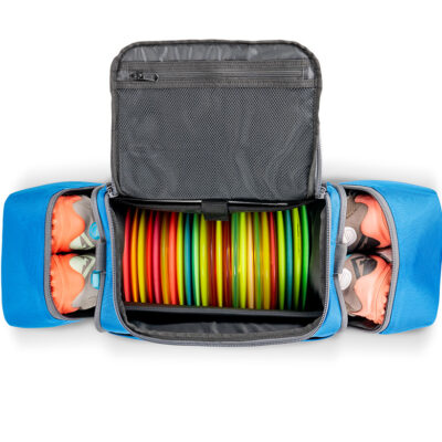 Blue disc golf duffel loaded with discs and shoes